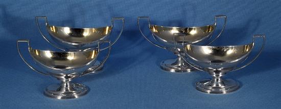A set of four George III silver salts, by Robert & David Hennell, Length 135mm, weight 12.8oz/400grms.